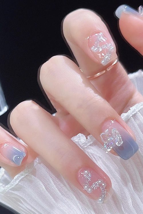 Frozen Blue Butterfly Wearable Nails Finished Manicure